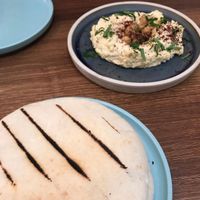 Flatbread and hummus  at Imad's Syrian Kitchen in London