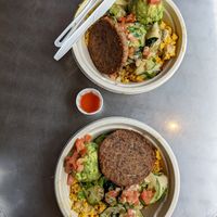Green machine bowls (quinoa, tofu scramble, veggies, green goddess sauce, taro patty, avocado mash) - DELICIOUS!! at The Spot in Princeville