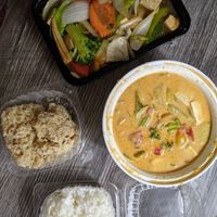 Total order with steamed white rice and brown rice. at Thai Taste in Amarillo