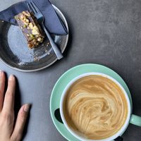 Granola bar and latte  at Copenhagen Coffee Lab in Hamburg