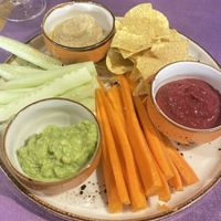 Tabla con dos tipos de hummus y guacamole   at Gusto BistroBar in Blanes