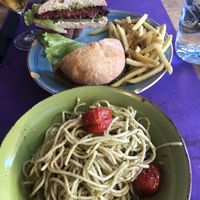 Vegan burger and pesto pasta   at Gusto BistroBar in Blanes