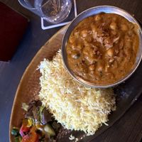 „CHANNA ALOO MASALA“ Kichererbsen mit Kartoffeln in roter Curry-Sauce, serviert mit Basmati Reis  at SVAAdish in Hamburg