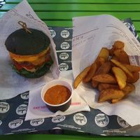 Cheeseburger and wedges, tomato basil sauce at FunKink Burgers in Bucharest
