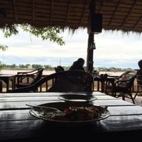 Eating while looking out to Laos over the Mekong at Mut Mee Restaurant in Nong Khai