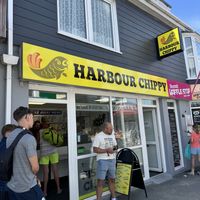 Town centre near the beach. Friendly staff .. Vegan options displayed just inside the shop.. Chips, sausages, burgers, nuggets, pea fritter and curry sauce. Quick service.   at The Harbour Chippy in Newquay