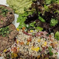 Black bean burger, guaca, quinoa and greens at Local - Av 24 in Lisbon
