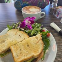 Salad with edible 🌸 at Victory Caffe in Van Nuys