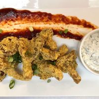 Crispy oyster mushrooms. The chili sauce was the BEST!!  at True Bistro in Somerville