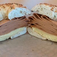 roasted garlic bagel with vegan egg and ham at Seize the Bagel - Orchards in Vancouver