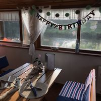 Inside with view of riber Raba at Paduc étterem in Sarvar