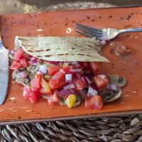 Half eaten mushroom quesadilla (without cheese) at Tactic Beach in Castelldefels