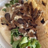 Inside of philly cheese steak  at Vegan 100 in English Harbour