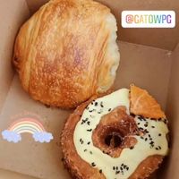 A pain au Chocolat and a citrus sesame cronut at Gâto in Winnipeg