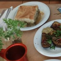Mousakka and grilled eggplant with pomegranate and raisins  at To Stachi in Crete