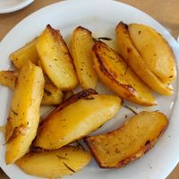 Potatoes in the oven with lemon and herbs!  miam at To Stachi in Crete
