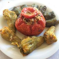stuffed tomato, zucchini flowers, and grape leaves at To Stachi in Crete