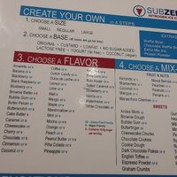 Menu, clearly marked vegan flavors at Sub Zero Nitrogen Ice Cream - E 82nd St in Indianapolis