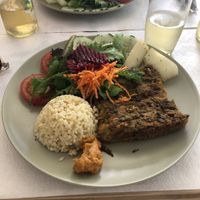 Lunch of the day (chickpea medaillon with rice and salad)  at Fava Mercearia Café in Lagos