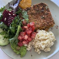 Plat du jour gratin tofu et légumes rôtis accompagnés de crudités   at Fava Mercearia Café in Lagos