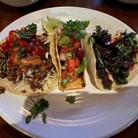 Platter of three “vegetarian” tacos on menu, all made vegan. L to R: cauliflower, chorizo, beet. 😋   at Barrio in Seattle