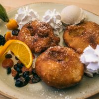 Apple fritters for dessert. at Max Pett in Munich