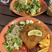 Schnitzels with chips and potato saladd  at Max Pett in Munich