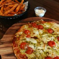 Vegan pesto pizza, delicious! at Mary's Place Dinner in Dos Hermanas