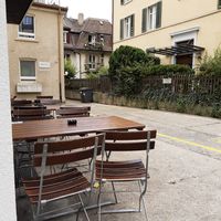 Outdoor seating (near busy road) at Züri Bistro Universitätstrasse in Zurich