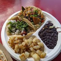 Dos Tacos Plate with "It's Not Frickin' Chicken" and "Pastor" tacos. at Tacos a Go Go - Woodland Heights in Houston