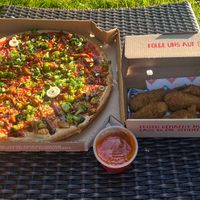 Pizza and vegan nuggets  at Domino's Pizza in Luebbenau