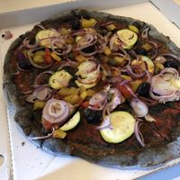Pizza Vegetariana without cheese but with active charcoal dough  at Pizza Manufactur Cleitzlers in Hallein