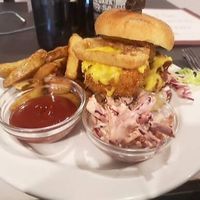 Ultimate burger (Moving Mountains burger or upgrade to Beyond), chick*n burger, b*con, cheeze, onion rings. 10/10 at The Queen Inn in Cwmbran