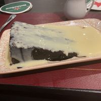 Chocolate fudge cake and custard   at The Queen Inn in Cwmbran
