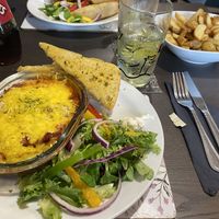 Lasagna, garlic bread and chips  at The Queen Inn in Cwmbran