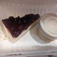 Gluten free and vegan gin and raspberry che*secake with cream (takeaway as too full to eat it there) at The Queen Inn in Cwmbran