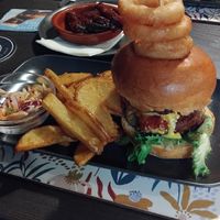 Mega burger with amazing  rib small plate in background  at The Queen Inn in Cwmbran