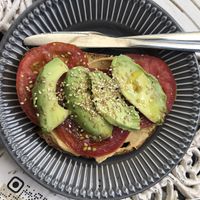 tostadas de hummus, tomate y aguacate. at Bio Café Alternativo Saudade in Lanzarote