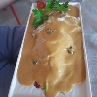 Carpaccio di seitan in stile "vitello tonnato" (vegan) at L'M Ristopizza in San Pantaleo