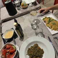 Spaghetti Spirulina with soy ragout and nutritional yeast. And Seitan Carpaccio with no-tuna sauce.  at L'M Ristopizza in San Pantaleo