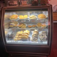 Delicious pastries with vegan options! Passionfruit cake and cinnamon rolls to drool over!  at Café Monteverde Coffee Shop in Monteverde