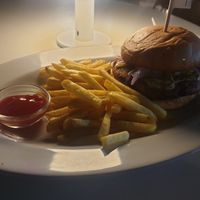 Burger and fries 7/10 fries are lacking they just felt like frozen oven chips slightly with the ketchup being ehh at Liim - 림 in Incheon