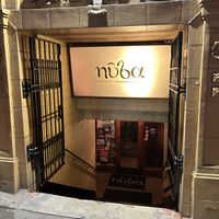 The entrance is on the very corner and downstairs!   at Nuba - Gastown in Vancouver