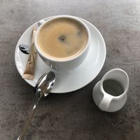 normal coffee w oat milk  at Café Florina in Hirschthal