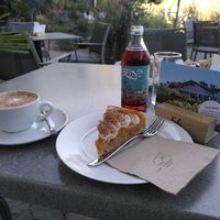 Outdoor seating, cappuchino and apple tart at Café Florina in Hirschthal