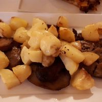 Scallopini with potatoes at Dolce Vegan in Florence