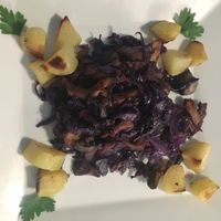 Seitan, cooked veggies, roasted potatoes and mushrooms at Dolce Vegan in Florence