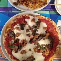 Pizza with perfect cheeese at Dolce Vegan in Florence