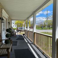 Porch seating at Grounds in New London