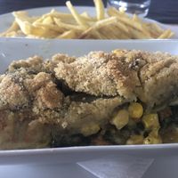 Spinach lasagna and homemade French fries   at O Branquinho in San Jorge